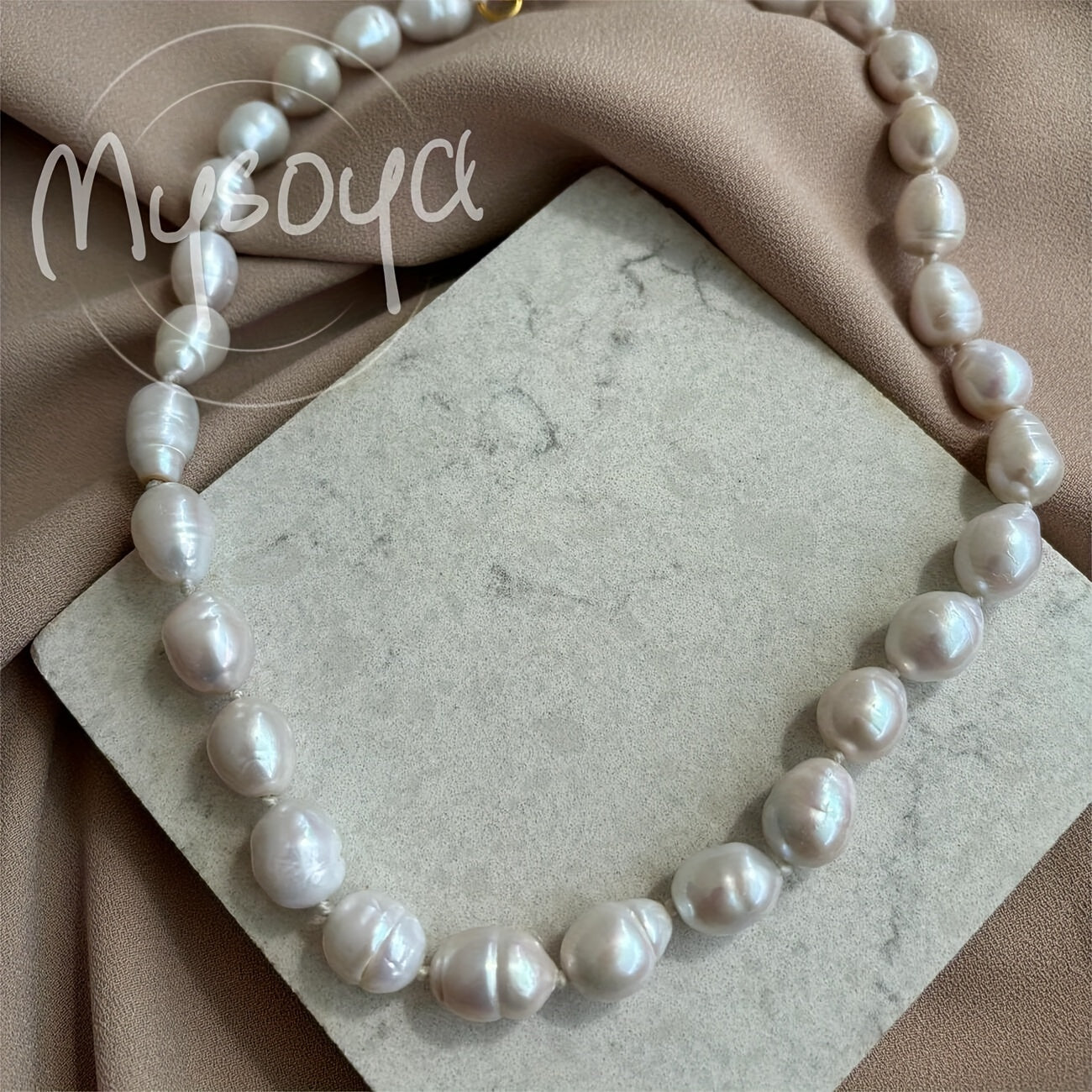 Exquisite handcrafted baroque pearl necklace featuring 10-12mm natural freshwater pearls. This stunning piece of jewelry comes beautifully packaged in a gift box, making it the perfect accessory for both daily wear and special occasions.