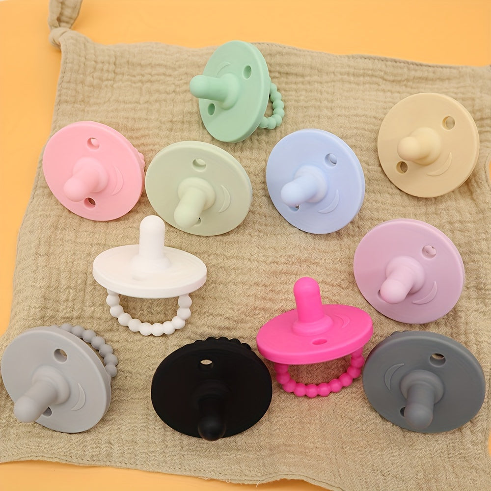 Soft silicone pacifier for newborns with cute round shape, designed to soothe and teethe. Suitable for both boys and girls.