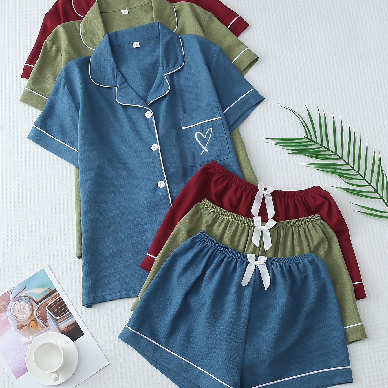 3-piece set of summer pajamas: Hemmed contrast color collar top with pocket embroidery, button closure, and bow shorts for women.