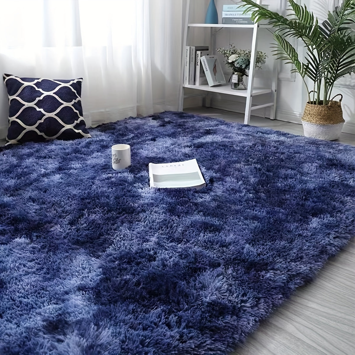 Add some style to your living space with this trendy tie-dye rug. Perfect for lounges, bedrooms, or any other cozy area, this fluffy throw carpet will bring warmth and decoration to your home. Versatile enough to be used in various spaces like living