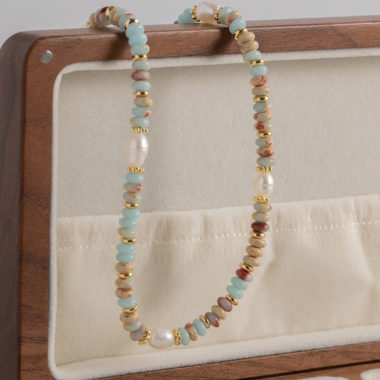 Vintage styled necklace featuring boho-chic freshwater pearls and natural stones, ideal for casual wear or as a thoughtful gift option.