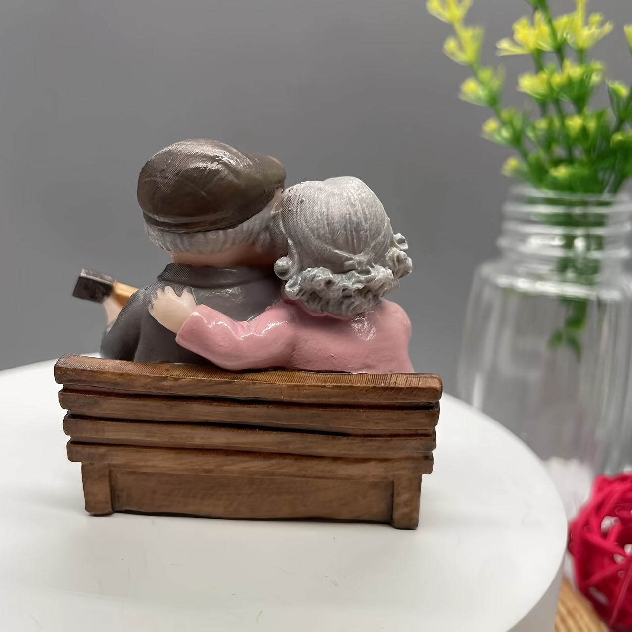 Resin figurine of charming elderly couple, ideal for home or office decor. Perfect Valentine's Day or anniversary gift.