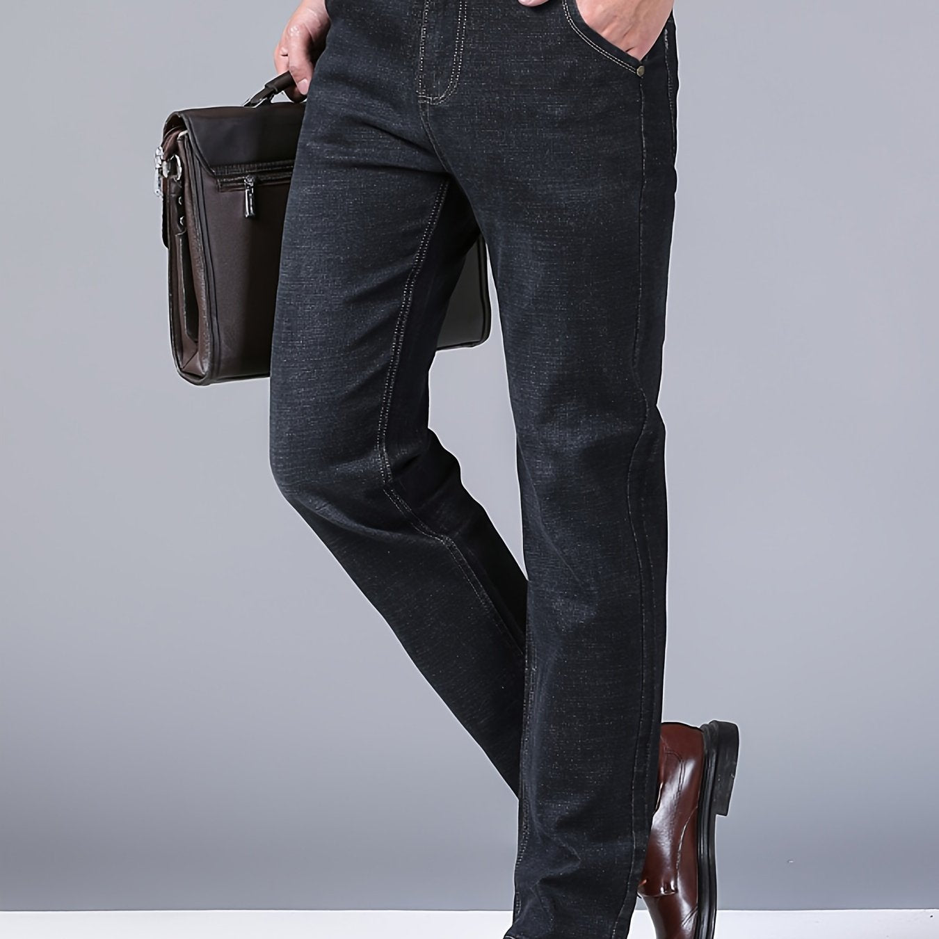 High-quality business casual denim pants for men, featuring a stretch comfort fit in a solid color washed finish. Made with all-season woven fabric of 65% cotton, 33.7% polyester, and 1.3%