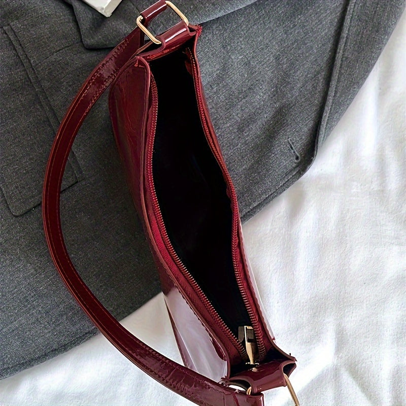 Vintage-style red handbag inspired by Hong Kong, unlined with fixed shoulder strap, perfect for casual outings.