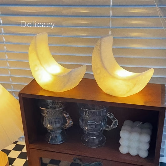 Portable Nordic-style LED moon-shaped lamp perfect for the bedroom, powered by batteries and ideal as a holiday decoration or gift.