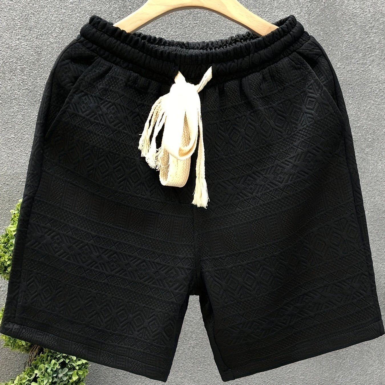 Breathable polyester blend drawstring shorts for men, ideal for summer outings and hiking.