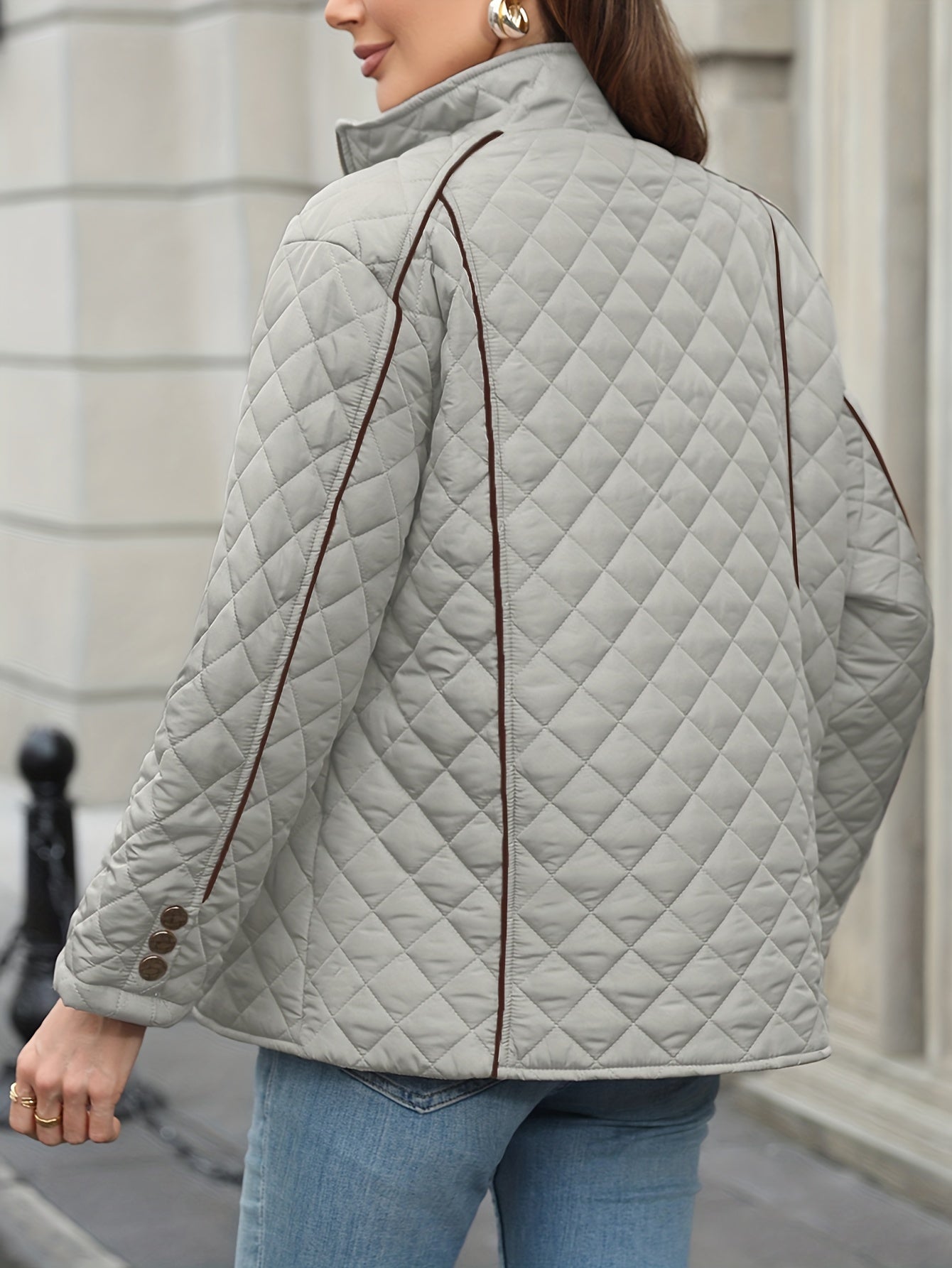 Women's plus size quilted jacket with zipper closure, polyester material, long sleeves, solid color, autumn/winter outerwear.