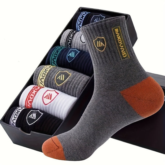 5 pairs of fashionable, breathable crew socks for men, perfect for cozy comfort in winter and autumn.