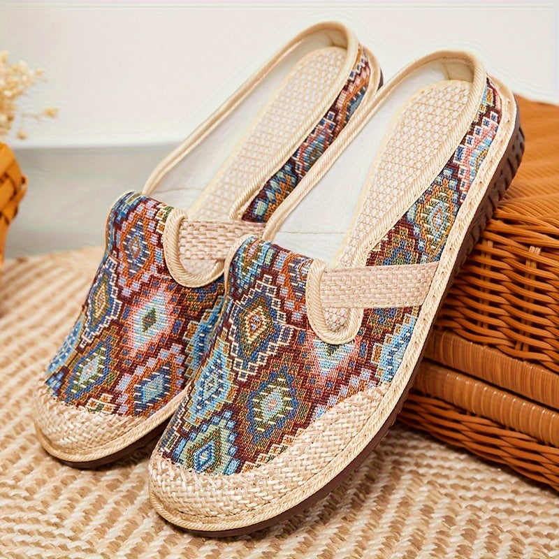 Breathable and lightweight linen slippers for women in a colorful geometric print. Features soft sole, round toe, and hand washable design for all-season comfort. Available in blue, pink