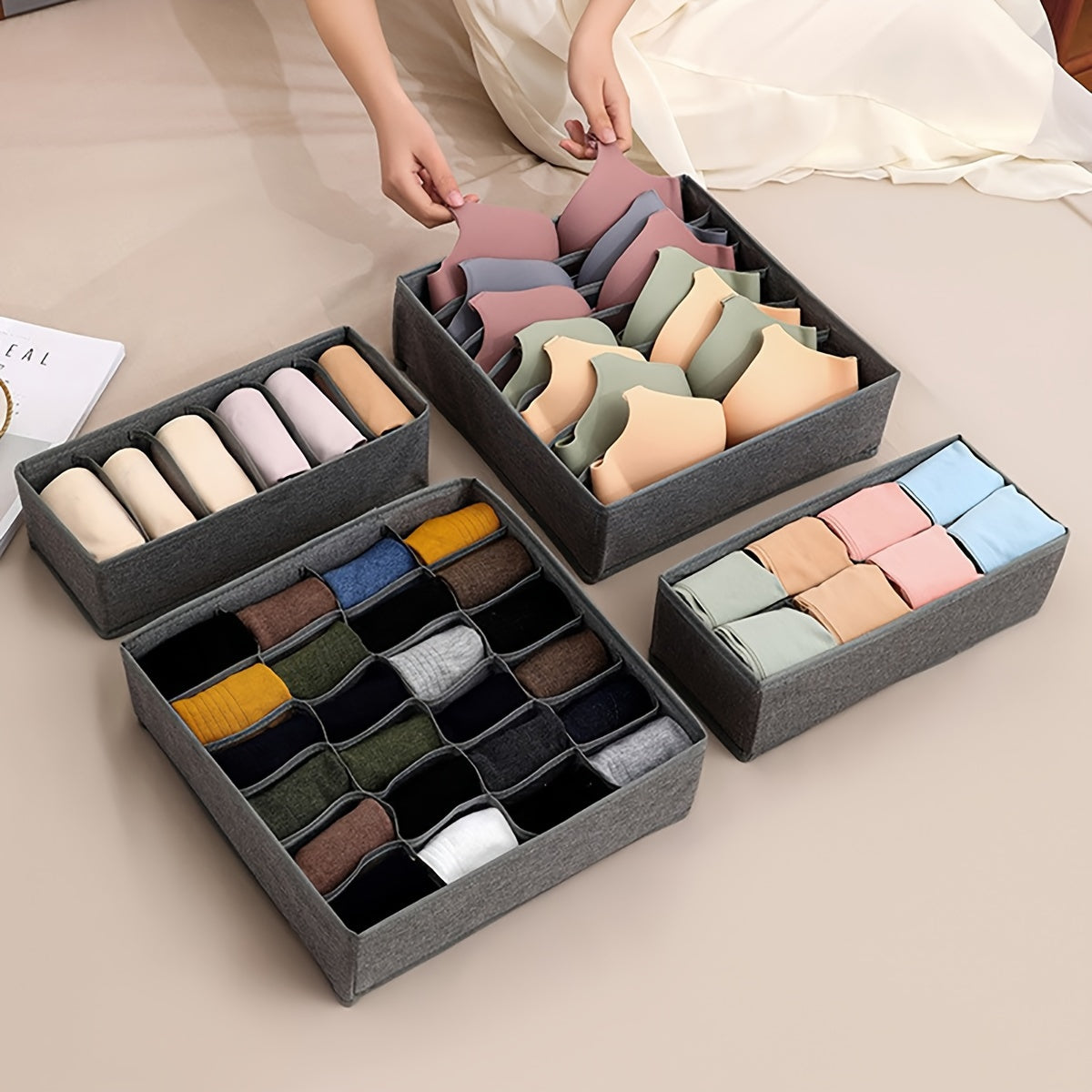 These 4 Foldable Non-woven Fabric Storage Boxes are designed specifically for organizing underwear, bras, socks, and other clothing items. Keep your wardrobe neat and tidy with these convenient compartment storage boxes that can easily be folded away