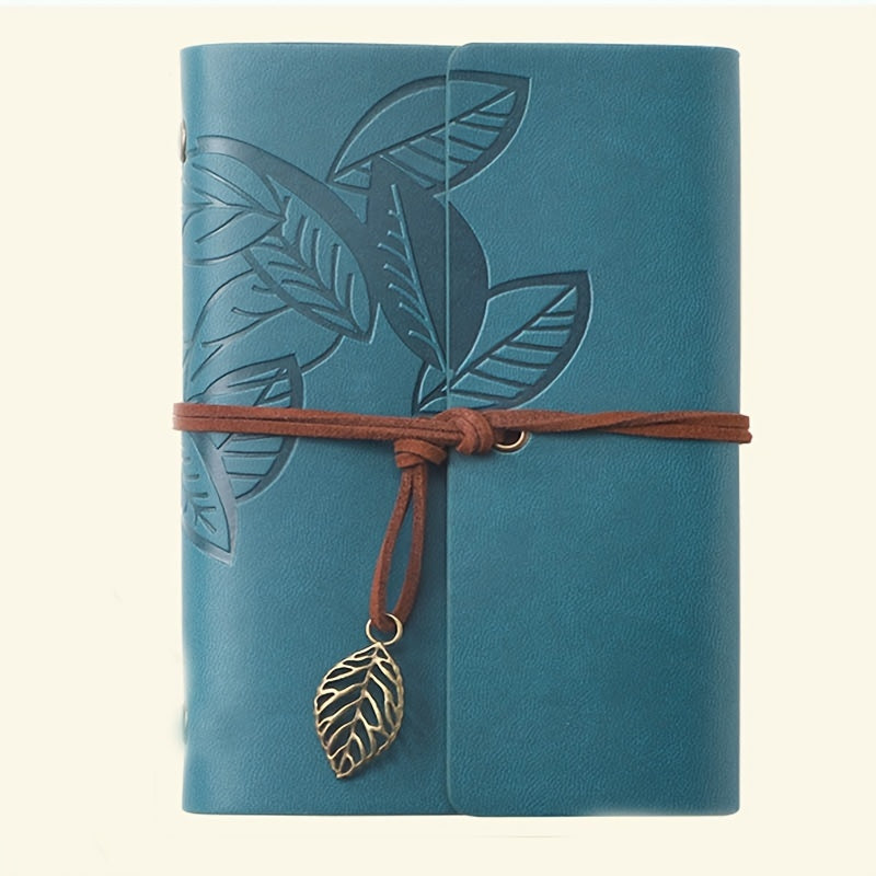 Vintage spiral-bound faux leather notebook with leaf-embossed design and strap closure, available in black, orange, and blue, perfect for students and travelers.