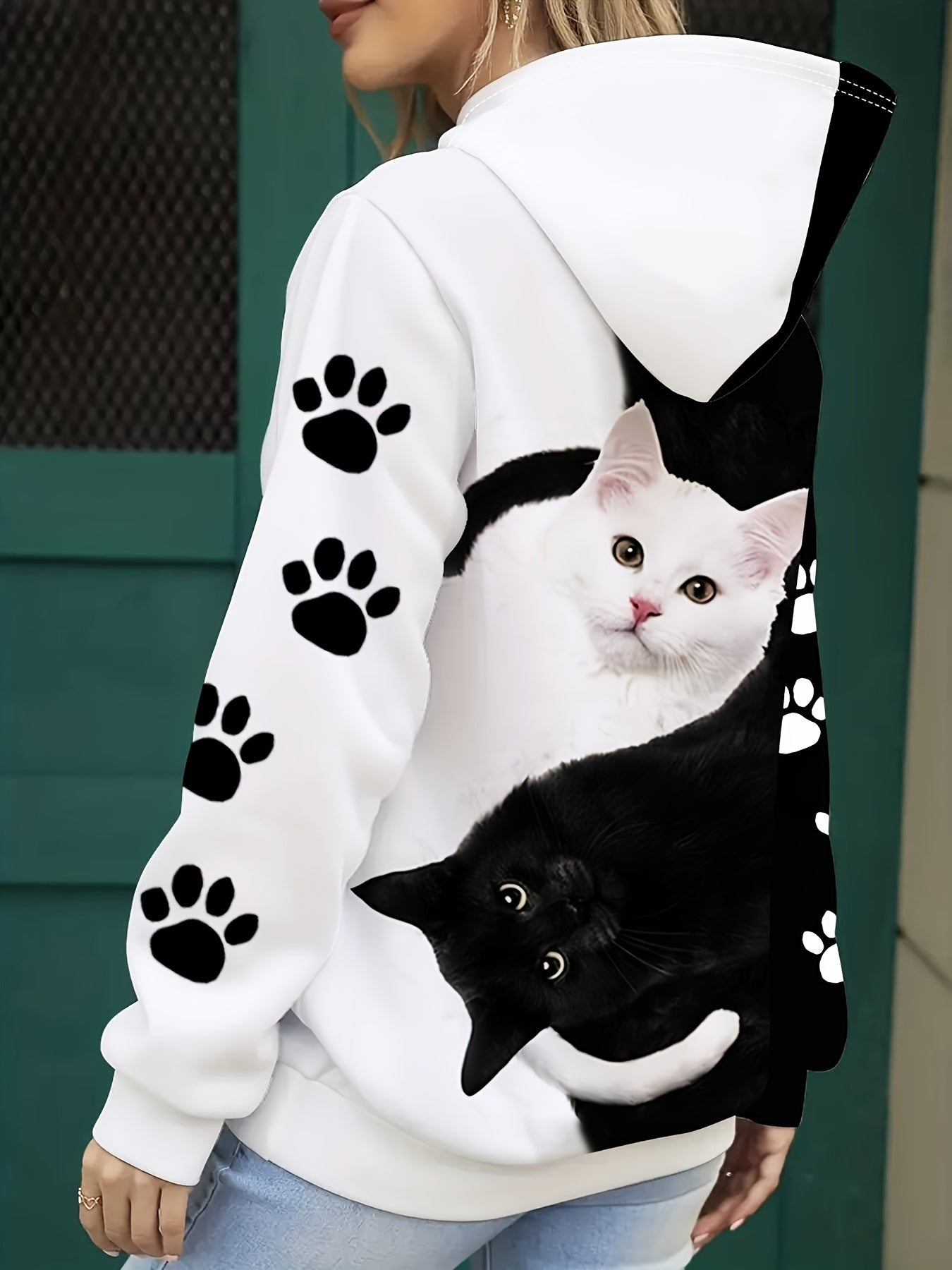 Cozy cat print hoodie for women, with kangaroo pocket, made of machine washable polyester blend.