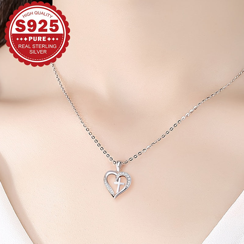 Elegantly designed heart cross pendant necklace made of Sterling Silver S925, adorned with Synthetic Zirconia. Hypoallergenic and lightweight at 4.5g, ideal for everyday wear or as a special Valentine's Day gift. Presented in a gift box for easy gifting.