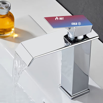 Single-hole stainless steel faucet for hot and cold water in home bathroom cabinet washbasin.