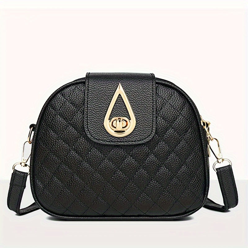 Vintage style faux leather crossbody bag in black with quilted design, adjustable strap, and phone pocket.