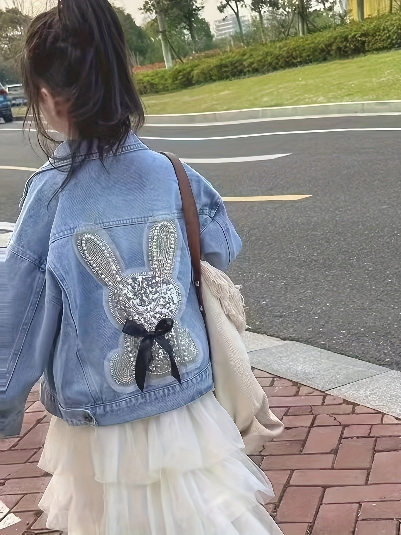 Casual, versatile denim jacket for chic girls with cute rabbit design; rayon blend, machine washable; ideal for spring/fall.