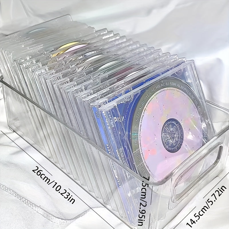 The Clear Acrylic CD/DVD Storage Basket is a sturdy and stylish solution for storing your media collection. This space-saving display rack can hold up to 20 standard cases, making it perfect for organizing your albums and games. Its durable construction