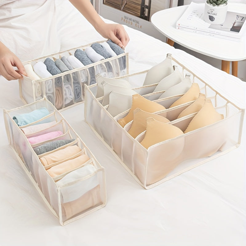 Three-piece storage bag with grids for organizing underwear, socks, and panties in drawers.