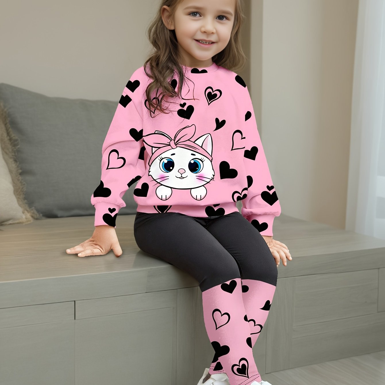 Cute cat & heart print girls' outfit set with comfy long sleeve tee and casual pants. Made from stretchy polyester blend, machine washable. Ideal for summer and outdoor activities.