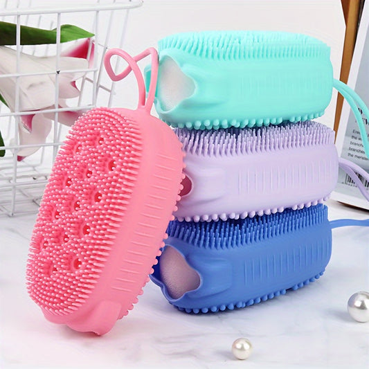 Silicone body scrubber for exfoliating and cleaning in the shower.