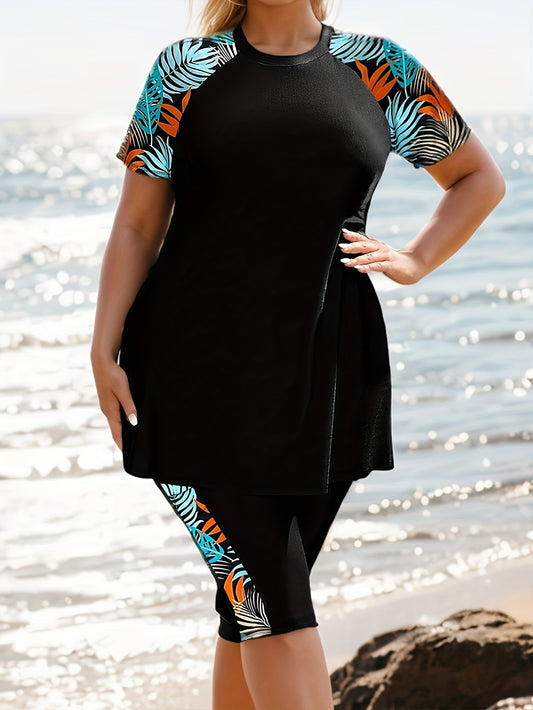 Tropical print swimsuit set for plus size women, made of stretchy polyester and elastane. Features round neck top with short sleeves and high-waist bottoms. Machine washable.