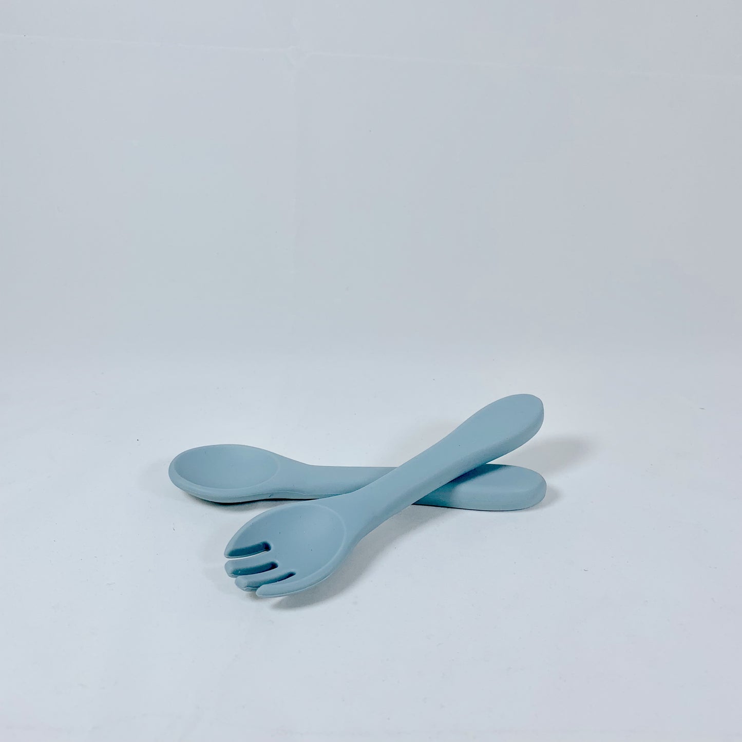 Children's flatware set with silicone fork and spoon, ideal for baby feeding.