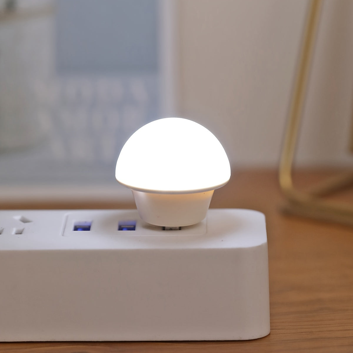 Compact, portable LED lamp for desktop use.