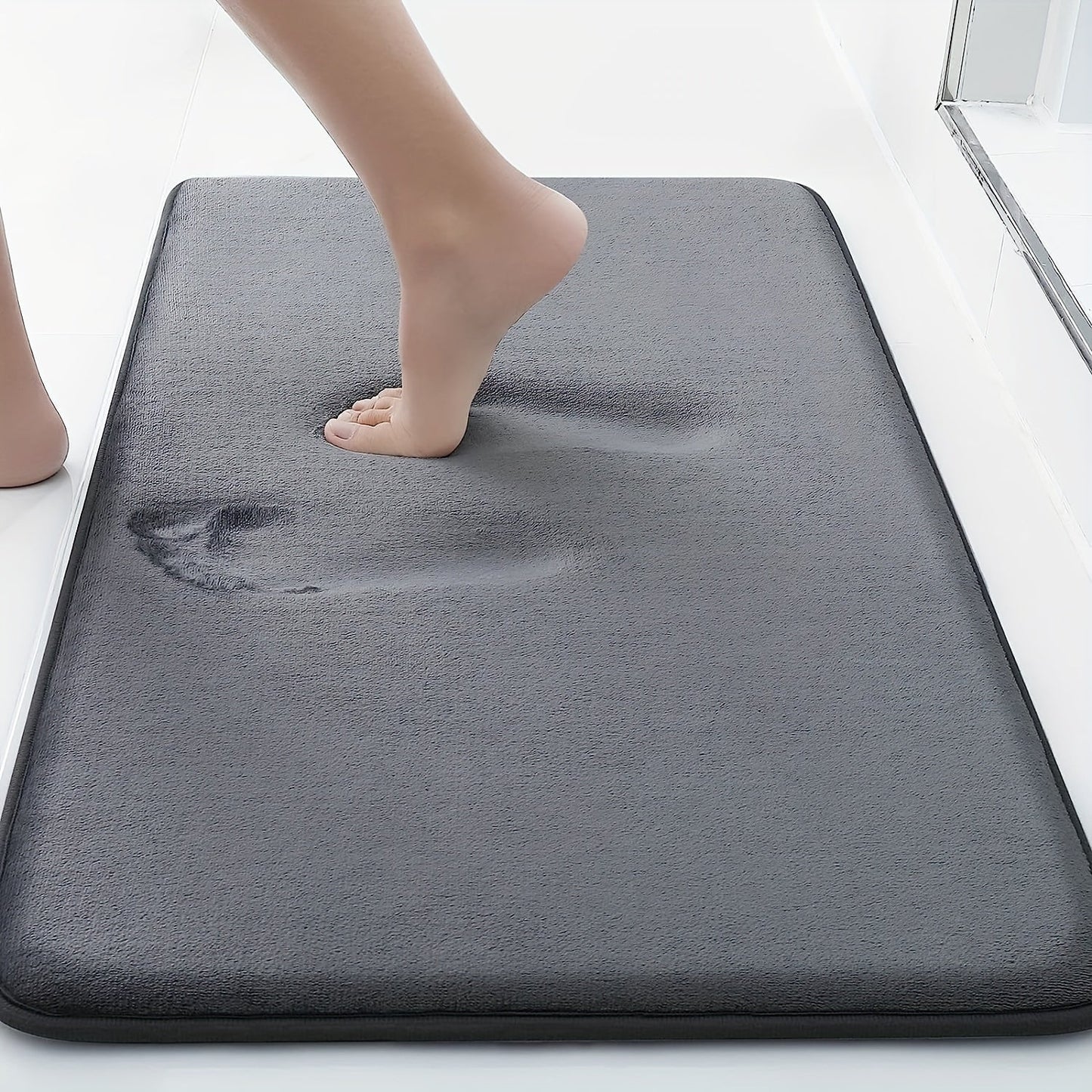 Indulge in Luxurious Comfort with our Ultra-Soft Memory Foam Bath Mat measuring 39.88cm x 59.94cm. It is Super Absorbent, Non-Slip, and Machine Washable, ensuring a Quick Dry for use in the Kitchen, Bathroom, Bedroom, or Living Room. Elevate your Home