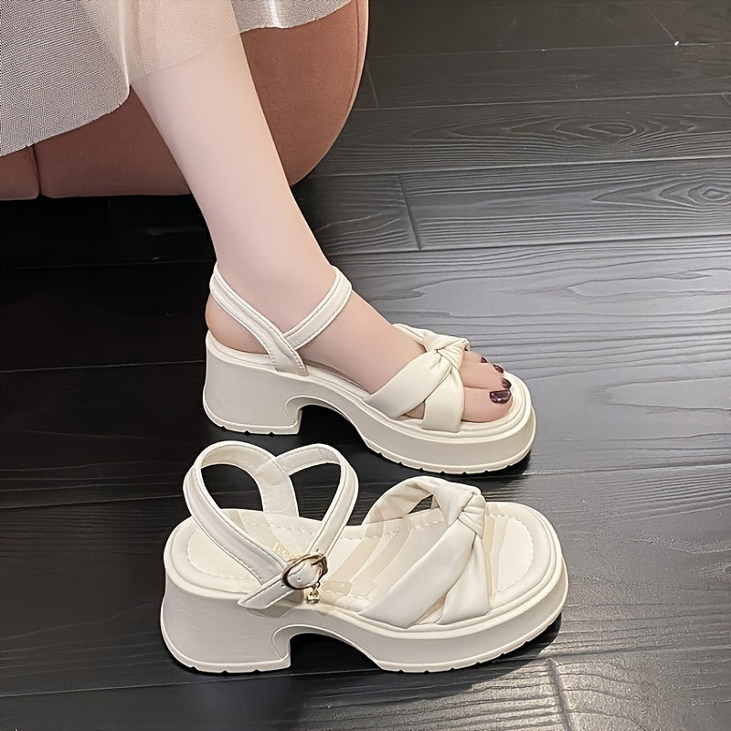 Stylish chunky heel sandals with knot design and buckle strap.