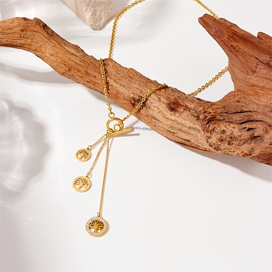 Stylish, vintage-inspired pendant necklace crafted from golden stainless steel with tassel and Tree of Life design. Ideal for both casual outfits and formal occasions, makes a romantic gift or adds a touch of elegance to street wear.