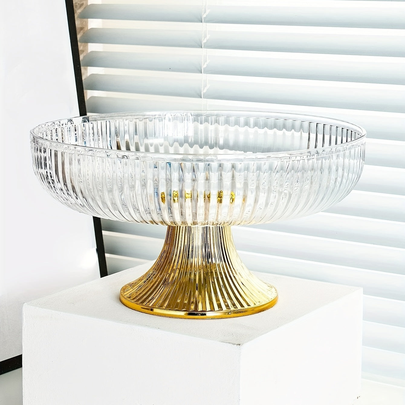 Beautiful acrylic fruit bowl with golden rim and luxurious texture. Perfect for snacks, candy, and fruits. Ideal for home decor, weddings, parties, and table centerpiece.