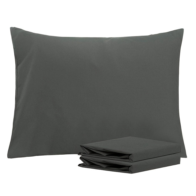 Get two sets of white pillowcases that are perfect for families, hotels, and apartments. These pillowcases provide a comfortable experience with their soft and breathable material. Made of high-quality fabric, they are suitable for bedroom, sofa, and