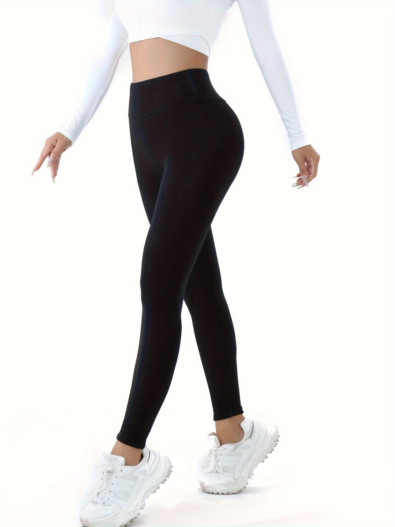 High-waist thermal leggings for women, ideal for fall/winter, solid color with knit fabric.