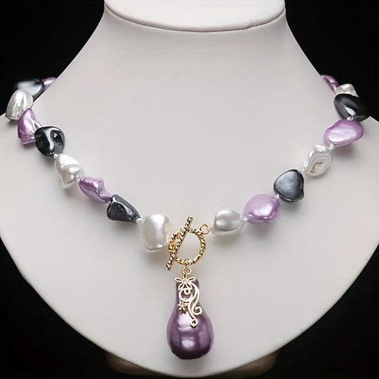 Stylish and unique pearl pendant necklace with a trendy design.