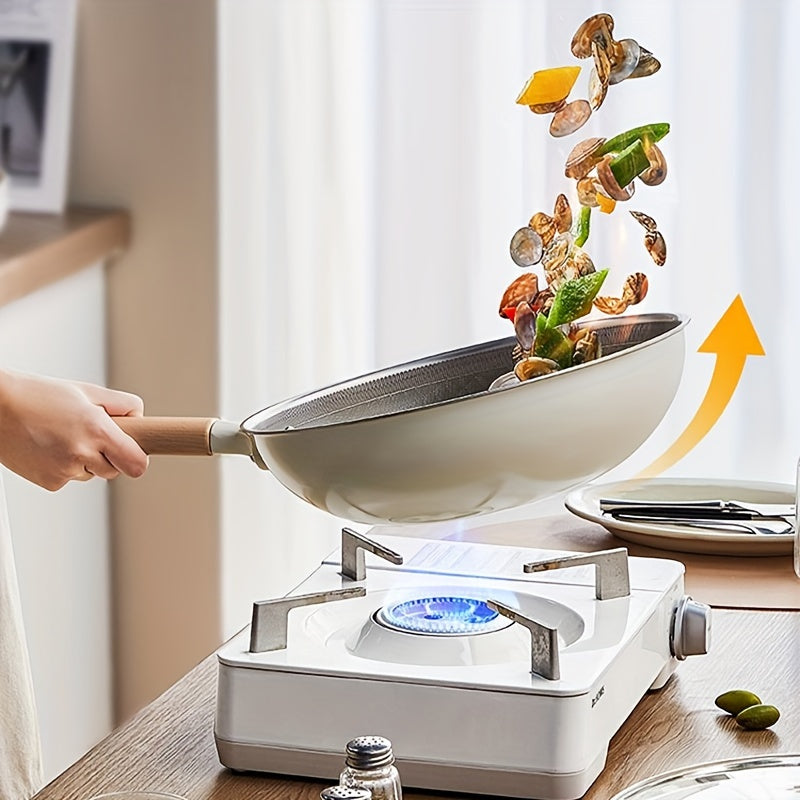 The COOKER KING Chef's Pan is a non-stick wok with a Titanium coating and stainless steel construction for healthy cooking. It features multi-layer construction, no chemical coating, and is PTFE & PFOA free. The pan is also induction compatible and comes