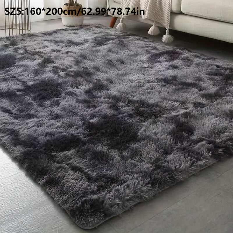 Long fleece carpet in a dark grey tie dye gradient, perfect for the living room coffee table or bedroom decor. This washable mat is fully padded and makes a great Halloween or Christmas gift.