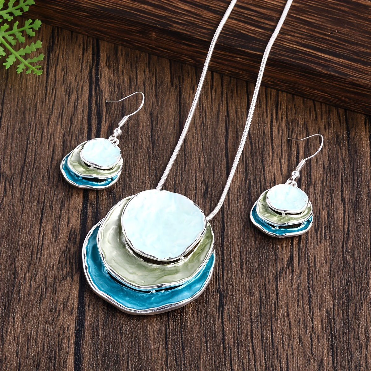 Chic and stylish Bohemian enamel jewelry set featuring a three-layer circular design made of zinc alloy. This adorable set makes a perfect gift for the special ladies in your life, ideal for holiday parties or as a girlfriend gift. Includes a necklace