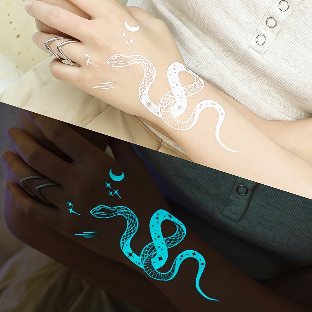 Blue luminous feather and snake tattoo stickers for women and girls, featuring white design. Fake bracelet, necklace, and face, chest, arm, hand, and finger tattoos that glow in the dark.