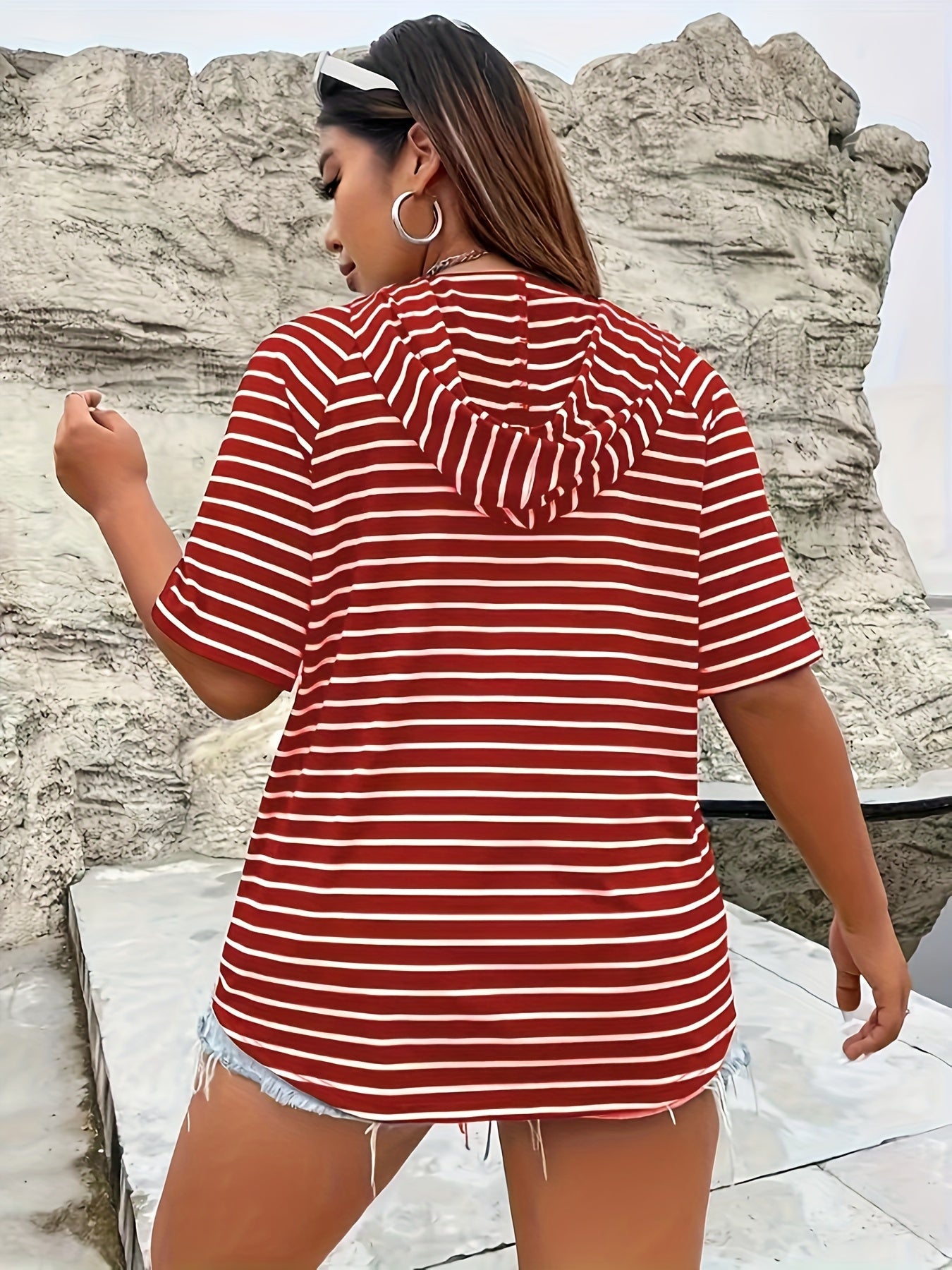 Women's red and white striped hooded T-shirt with zipper, drawstring, and kangaroo pocket. Made of polyester spandex blend knit fabric, relaxed fit for spring/summer collection.