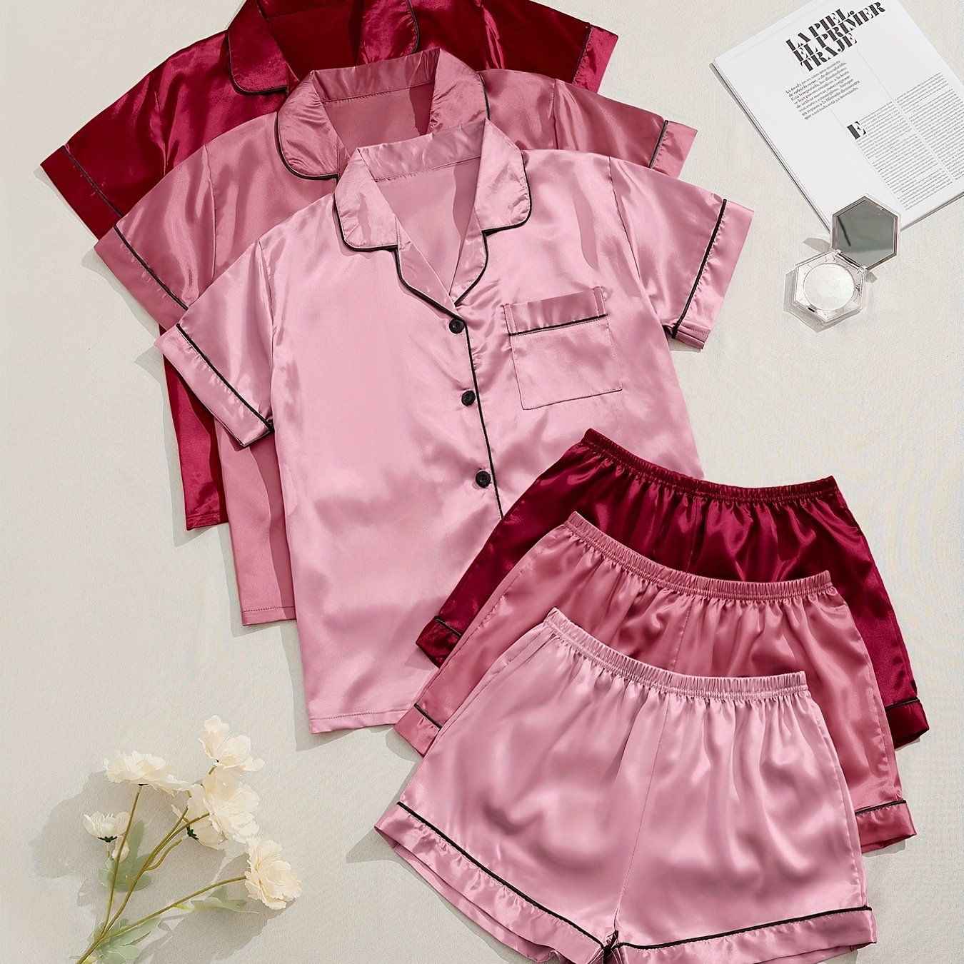 Women's Satin Pajama Set includes short-sleeve top and elastic waistband shorts for sleepwear and loungewear.