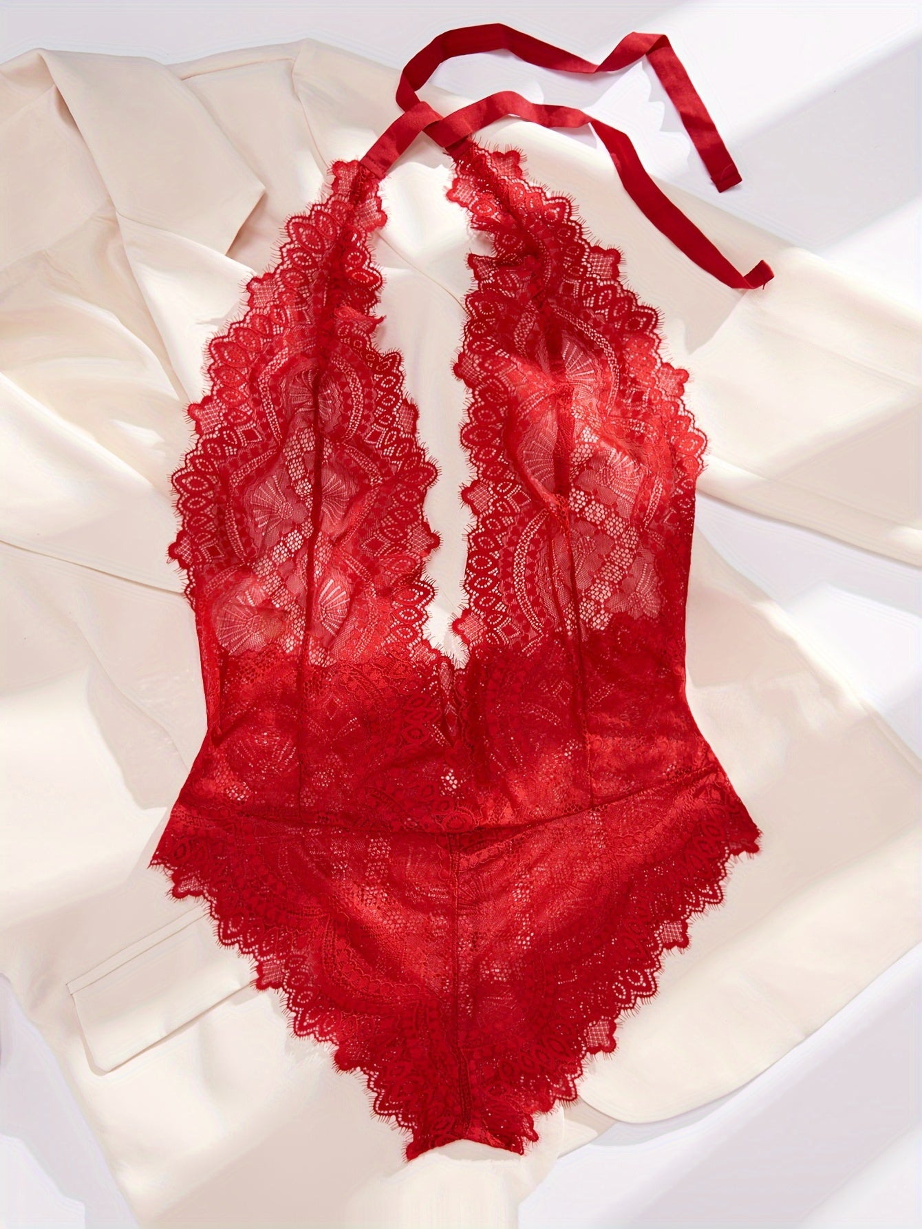 Seductive lace teddy and backless bodysuit for women.