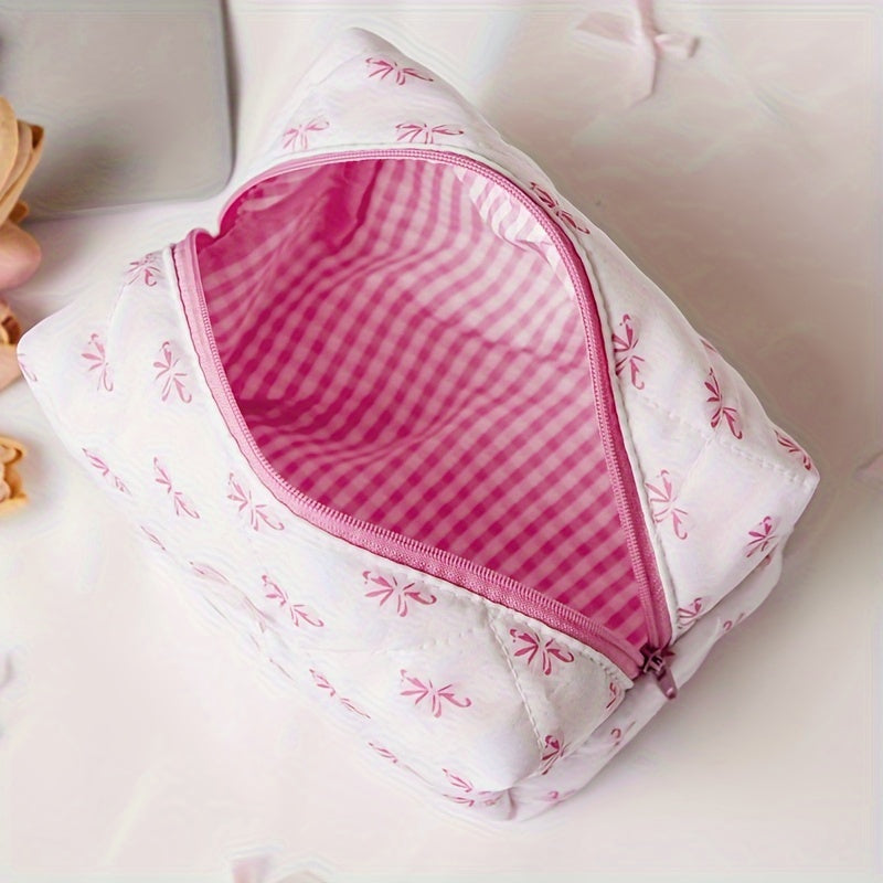 Spacious portable makeup organizer with chic rose print and bowknot detail, made of non-waterproof polyester.