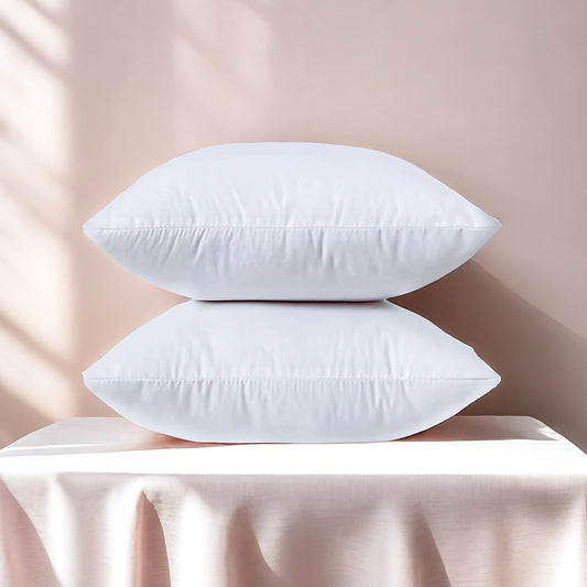 Soft, fluffy square pillow inserts with zipper closure available in sets of 1, 2, or 4. Made with 100% machine washable polyester cover material and filled with 100% polypropylene. These white-colored pillows are suitable for all seasons and can be used