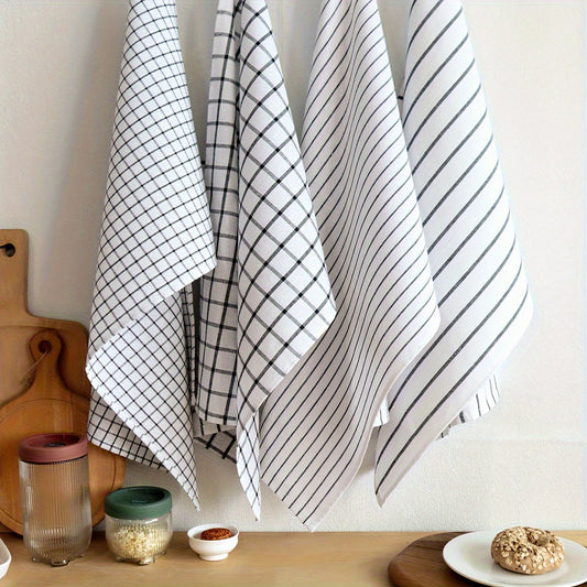 This set includes 4 versatile kitchen towels in the Black Series, perfect for use in the home. These towels are made of durable color-woven pure fabric and feature a large rectangular size (50*70cm/19.69*27.56inch). They can be used for a variety of