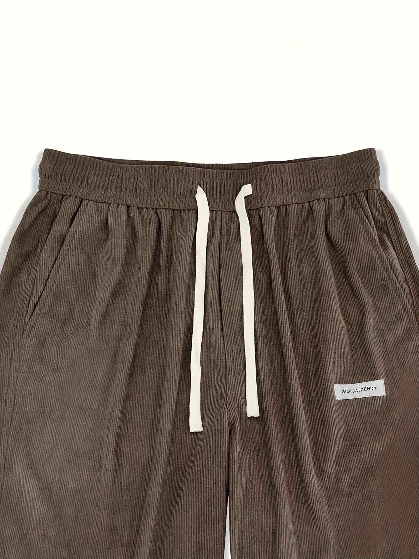 Men's casual corduroy pants with drawstring waist, ideal for outdoor activities and commuting.