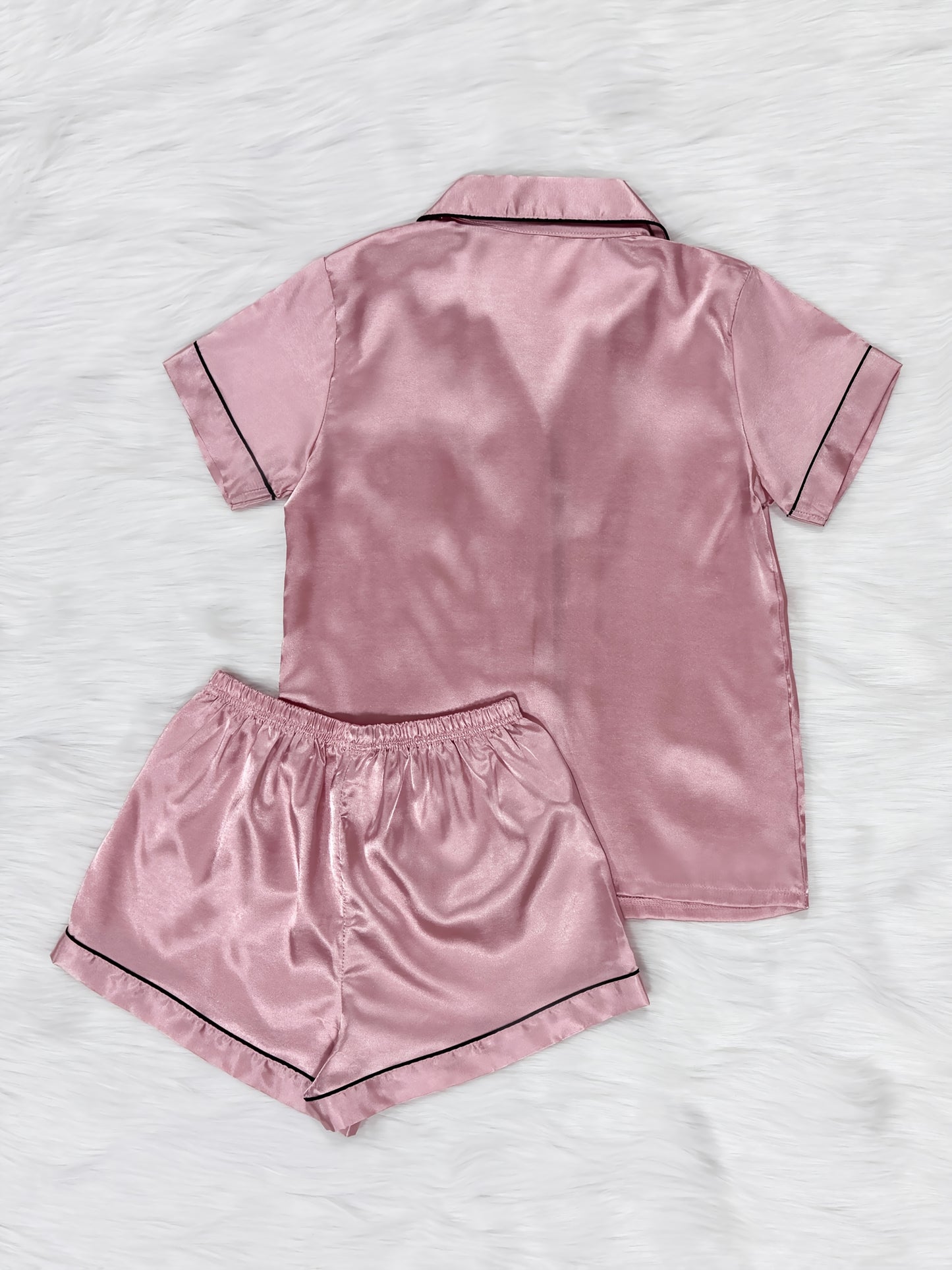 Casual satin pajama set for women with short sleeve top, lapel buttons, and shorts for a comfortable fit.