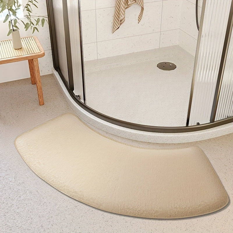 This non-slip bath mat is made of thickened polyester and designed for use as a shower door rug or entryway foot mat. It can be hand-washed and has a low pile, making it easy to clean. This machine-made mat weighs 660g per square meter and is 1.2cm