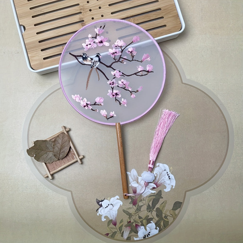 Beautifully crafted Chinese style silk embroidered fan with decorative tassel flower, perfect for use at home, while traveling, in school, or in the office.