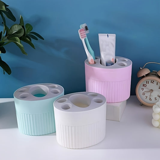 Toothbrush holder stand for bathroom countertop storage.