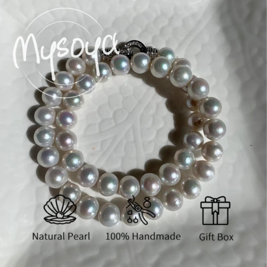 Elevate your style with the MYSOYA Elegant Large Natural White Pearl Necklace, featuring stunning 9-10mm pearls. This necklace comes in an exquisite gift box, making it perfect for any occasion - from daily wear to parties, birthdays, anniversaries